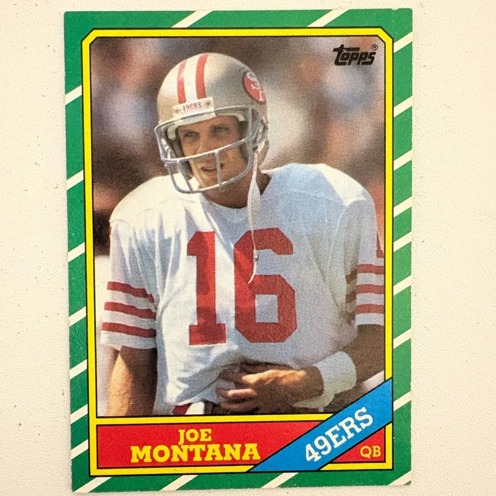 Three Sports Trading Cards: Joe Montana, Bo Jackson (Football), Reggie Jackson